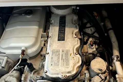 Slide: The Image of Engine compartment of a 2002 Cabo 35 Flybridge boat. - 21