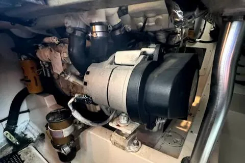 Slide: The Image of Engine compartment of a 2002 Cabo 35 Flybridge boat. - 28