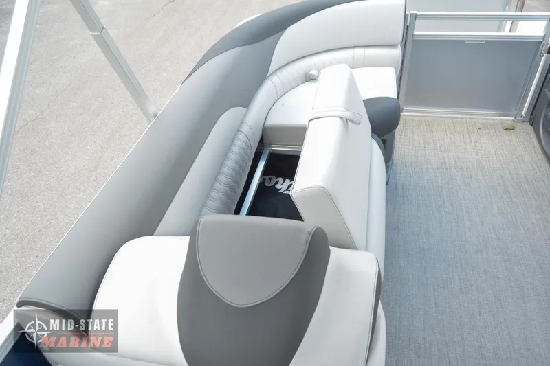 Slide: The Image of 2024 Tahoe Pontoon LTZ Quad Lounger interior seating with gray and white upholstery. - 21