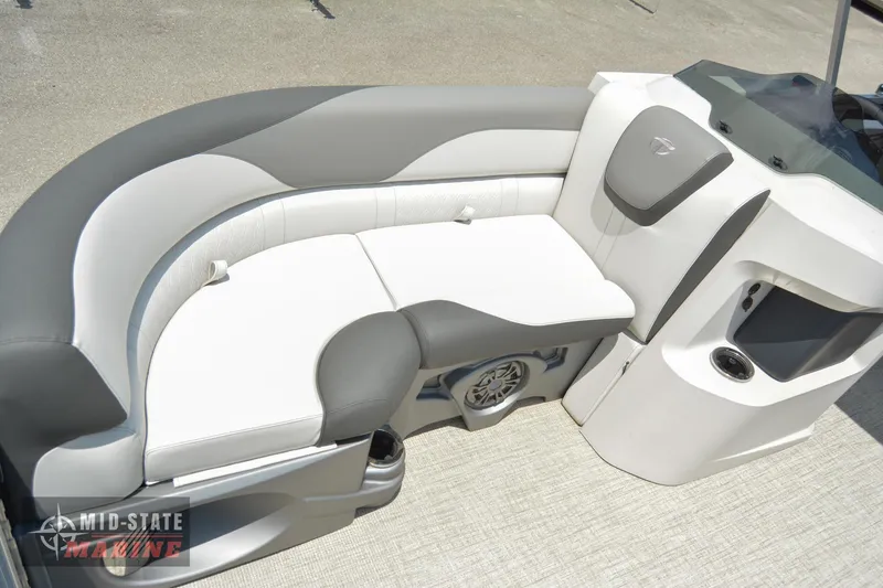Slide: The Image of 2024 Tahoe Pontoon LTZ Quad Lounger interior with gray and white seating. - 7