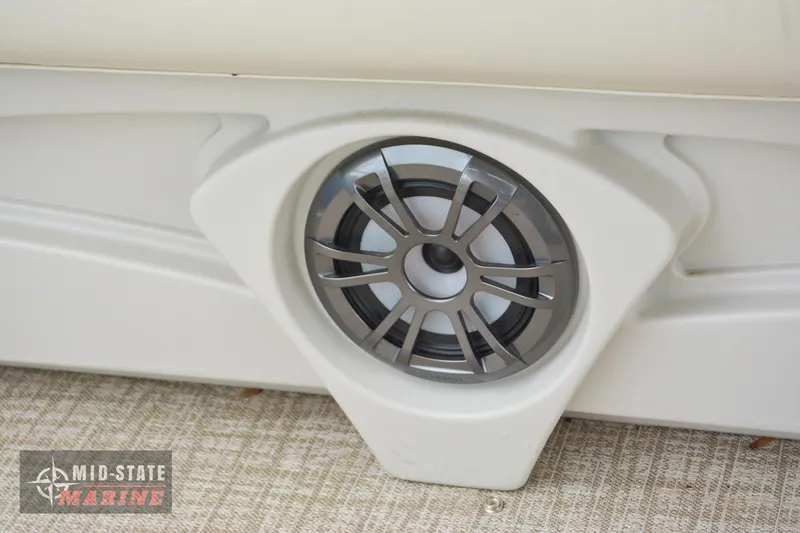 Slide: The Image of 2024 Tahoe Pontoon Sport 85 Quad Lounger speaker detail, Mid-State Marine logo. - 13