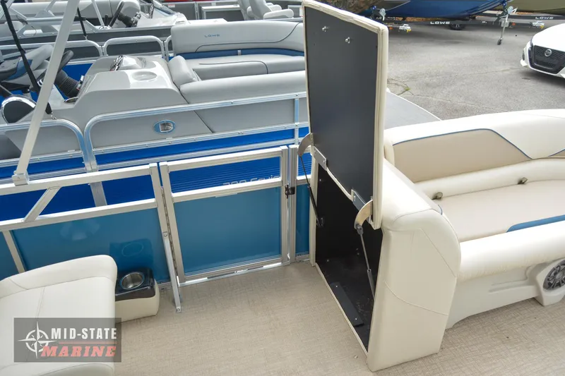 Slide: The Image of 2024 Tahoe Pontoon Sport 85 Quad Lounger interior with seating and gate. - 15