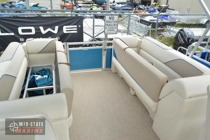 Slide: The Image of 2024 Tahoe Pontoon Sport 85 Quad Lounger interior at Mid-State Marine dealership. - 16