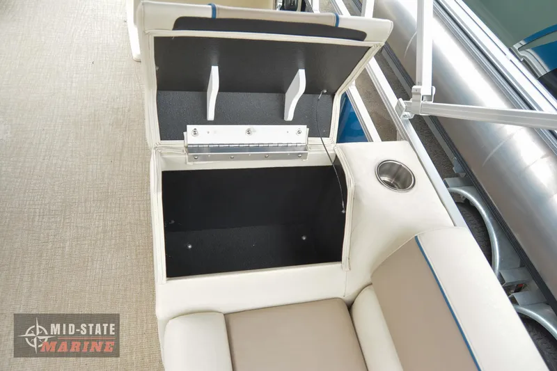 Slide: The Image of 2024 Tahoe Pontoon Sport 85 Quad Lounger storage compartment with cup holder. - 17