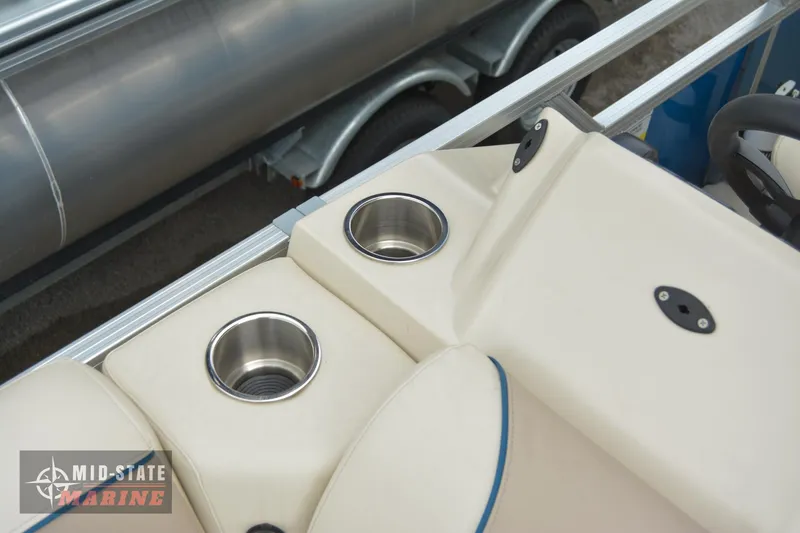 Slide: The Image of 2024 Tahoe Pontoon Sport 85 Quad Lounger cup holders and seating detail. - 19