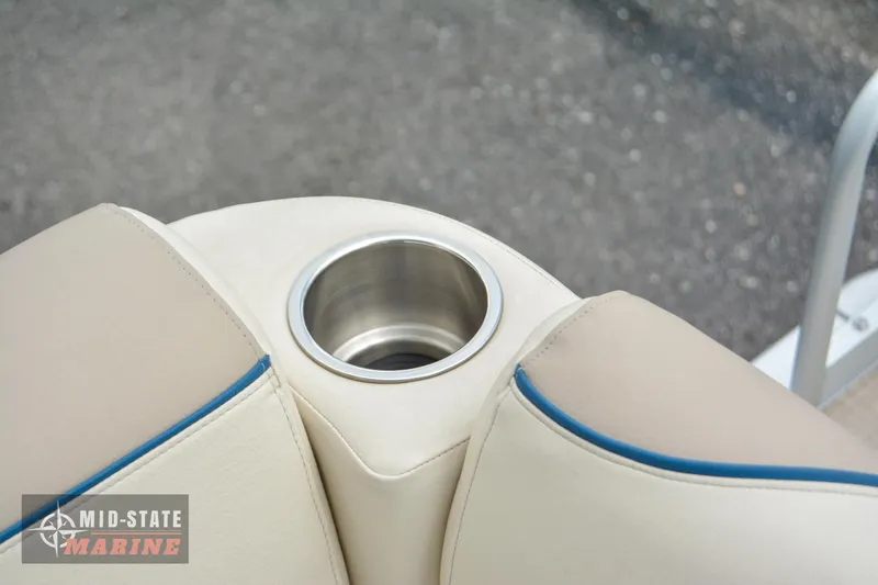 Slide: The Image of Close-up of 2024 Tahoe Pontoon Sport 85 Quad Lounger cup holder. - 23