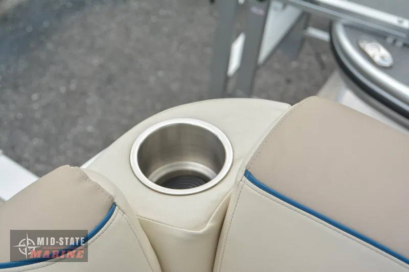 Slide: The Image of 2024 Tahoe Pontoon Sport 85 Quad Lounger cup holder detail. - 24