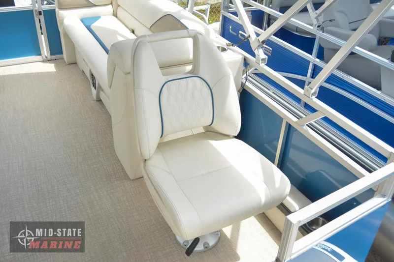 Slide: The Image of 2024 Tahoe Pontoon Sport 85 Quad Lounger interior with plush seating and modern design. - 8