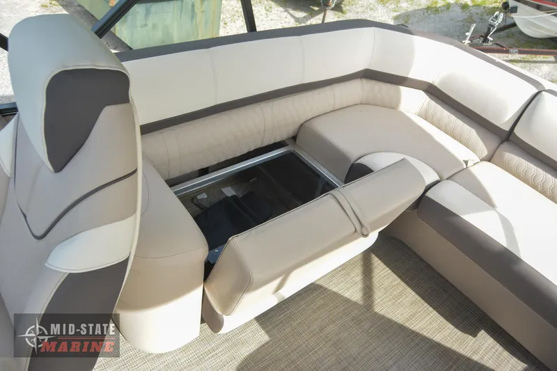 Slide: The Image of 2024 Tahoe Pontoon Cascade Elite Windshield interior seating area. - 27