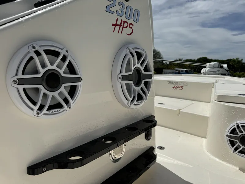 Slide: The Image of 2022 Pathfinder 2300 HPS boat with speakers and deck view. - 13