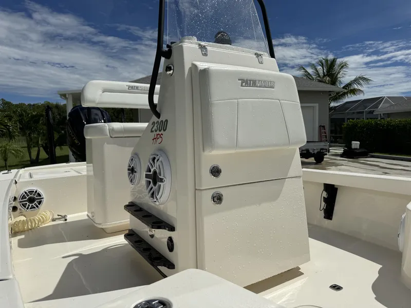 Slide: The Image of 2022 Pathfinder 2300 HPS boat interior with console and seating. - 15