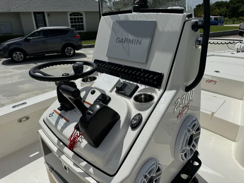 Slide: The Image of 2022 Pathfinder 2300 HPS boat console with Garmin navigation system. - 19