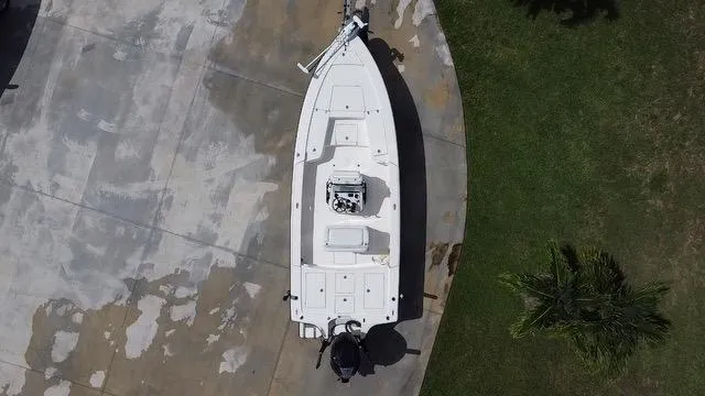 Slide: The Image of Aerial view of a 2022 Pathfinder 2300 HPS boat on a concrete surface. - 5