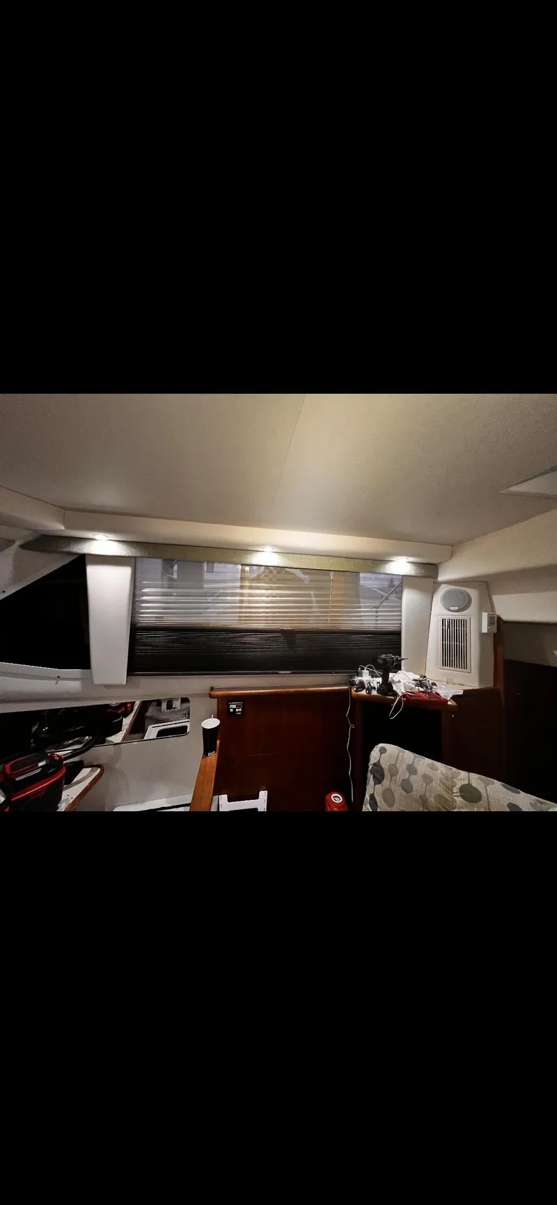 Slide: The Image of 1997 Carver 355 Main Ship Aft Cabin interior with seating and storage. - 25