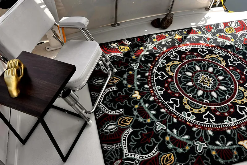 Slide: The Image of Aft cabin of 1997 Carver 355 with ornate rug and seating area. - 26