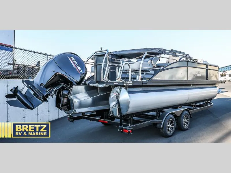 Slide: The Image of 2025 Aria Ultra-Lounge 22UC pontoon boat with Mercury outboard motor on trailer. - 11