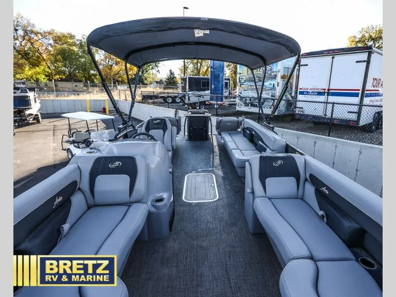 Slide: The Image of 2025 Aria Ultra-Lounge 22UC pontoon boat with spacious seating and canopy at Bretz RV & Marine. - 16