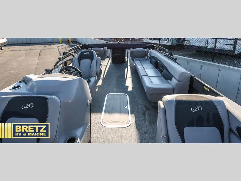 Slide: The Image of 2025 Aria Ultra-Lounge 22UC pontoon boat interior with spacious seating, showcased by Bretz RV & Marine. - 19