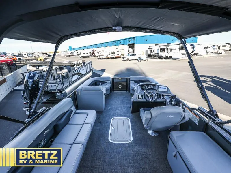 Slide: The Image of 2025 Aria Ultra-Lounge 22UC pontoon boat interior at Bretz RV & Marine dealership. - 21