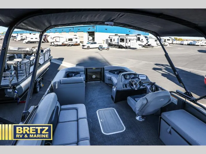 Slide: The Image of 2025 Aria Ultra-Lounge 22UC pontoon boat interior at Bretz RV & Marine dealership. - 22