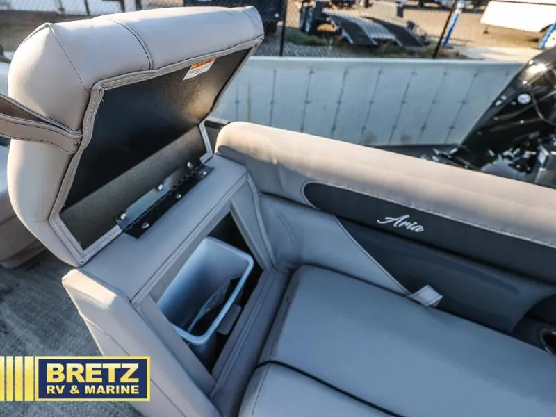 Slide: The Image of Aria Ultra-Lounge 22UC 2025 boat seat with storage compartment open. - 29