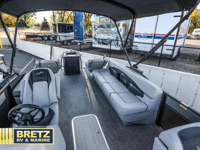 Slide: The Image of 2025 Aria Ultra-Lounge 22UC pontoon boat interior at Bretz RV & Marine dealership. - 31
