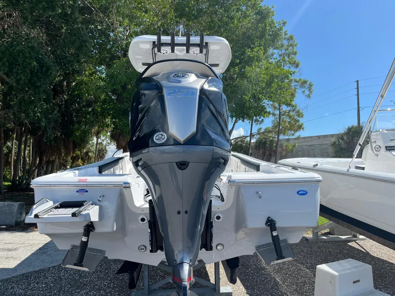 Slide: The Image of 2025 Tidewater 2300 Carolina Bay boat with powerful outboard motor. - 3