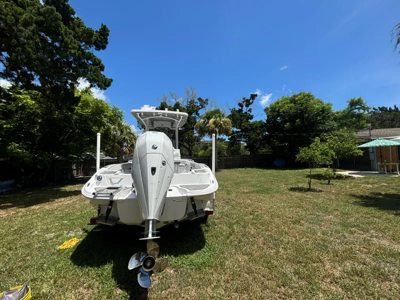 Slide: The Image of 2023 ALK2 Powerboats 25 CRX in a sunny backyard setting. - 6