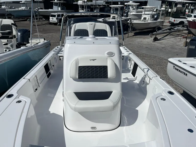 Slide: The Image of 2025 Tidewater 2110 Bay Max boat interior at a marina. - 3