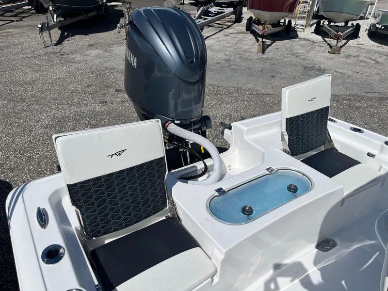 Slide: The Image of 2025 Tidewater 2110 Bay Max boat with Yamaha engine and seating. - 5