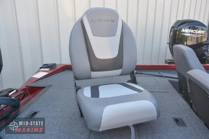 Slide: The Image of 2024 Lowe Stinger 195 Bass boat seat with Mercury engine in background. - 15