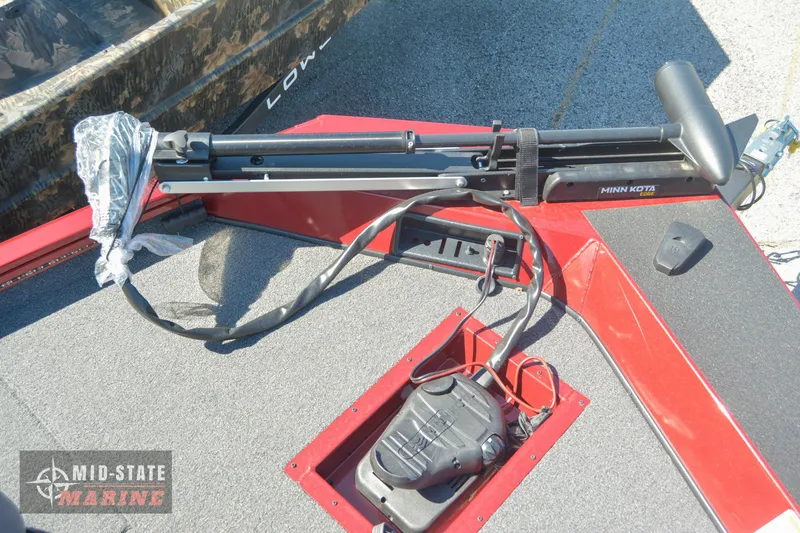 Slide: The Image of 2024 Lowe Stinger 195 Bass boat with Minn Kota trolling motor. - 17