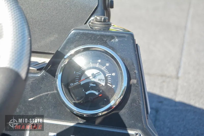 Slide: The Image of 2024 Lowe Stinger 195 Bass boat RPM gauge close-up. - 22