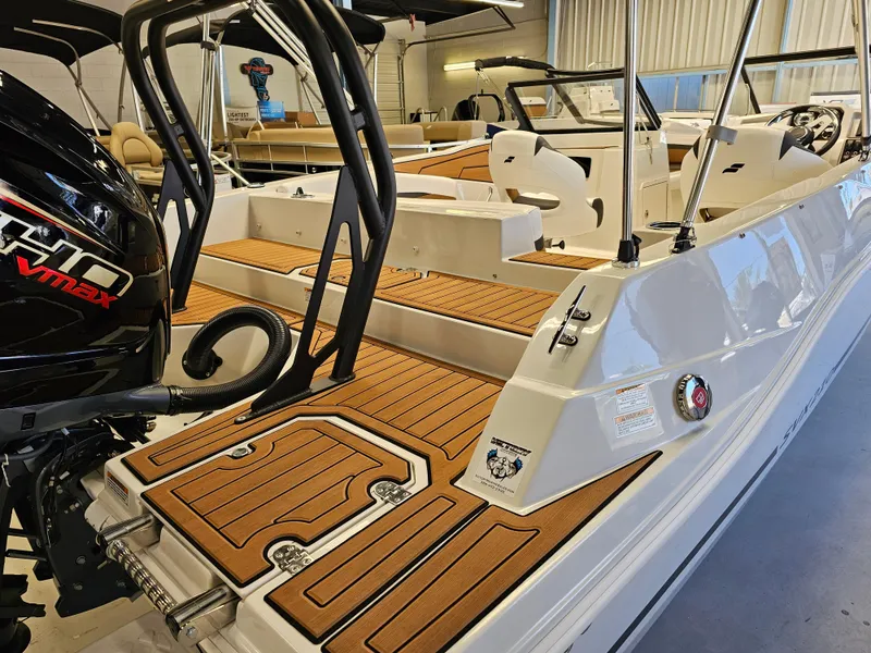 Slide: The Image of 2024 Starcraft SVX 210 OB DC boat with Yamaha VMAX outboard engine. - 4