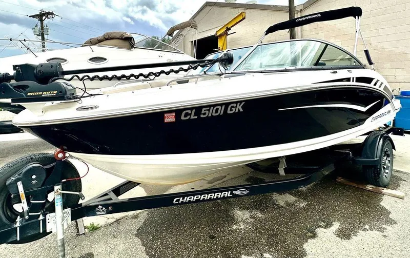 Slide: The Image of 2018 Chaparral 203 VR boat on trailer in outdoor setting. - 3