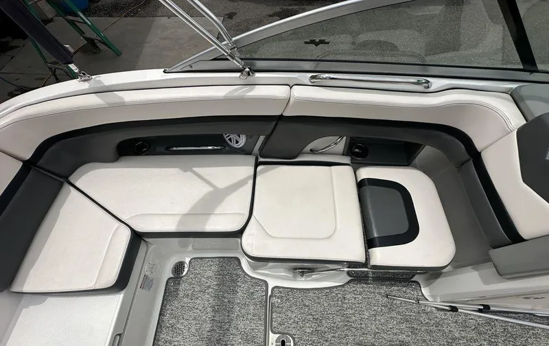 Slide: The Image of 2018 Chaparral 203 VR boat interior with white and gray seating. - 8