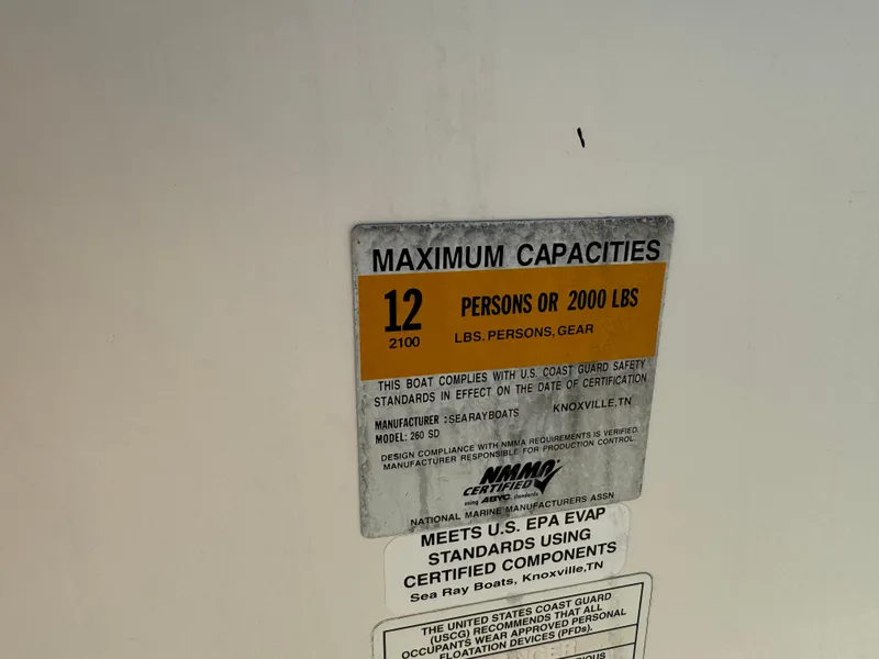 Slide: The Image of Capacity label for 2012 Sea Ray 260 SD: 12 persons or 2000 lbs. - 28