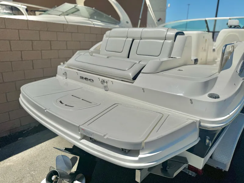 Slide: The Image of 2012 Sea Ray 260 SD boat, rear view with seating and swim platform. - 6