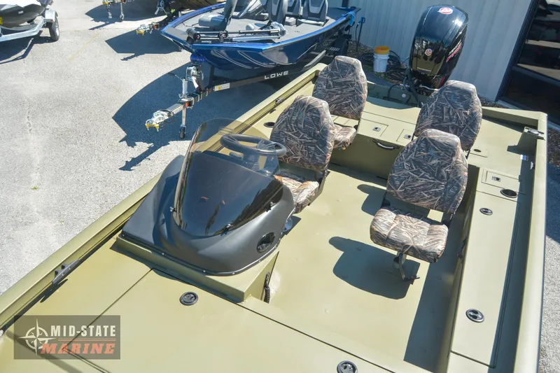 Slide: The Image of 2024 Lowe Outlet 20 boat with camo seats at Mid-State Marine. - 15