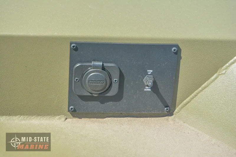 Slide: The Image of 2024 Lowe Outlet 20 power socket and switch panel on a boat. - 16