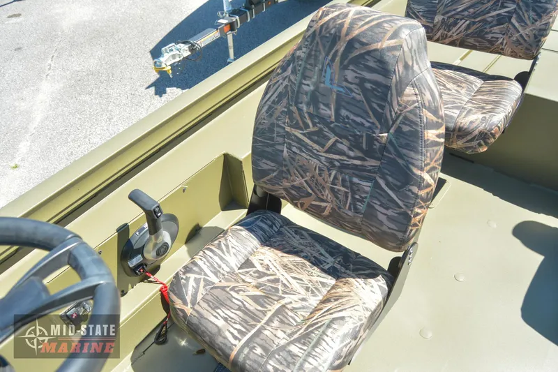 Slide: The Image of 2024 Lowe Outlet 20 boat with camo seats and steering console. - 19