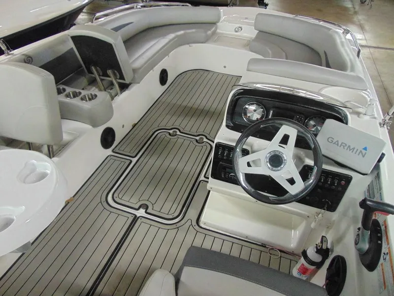 Slide: The Image of 2019 Hurricane SS 201 I/O boat interior with Garmin navigation system and spacious seating. - 4