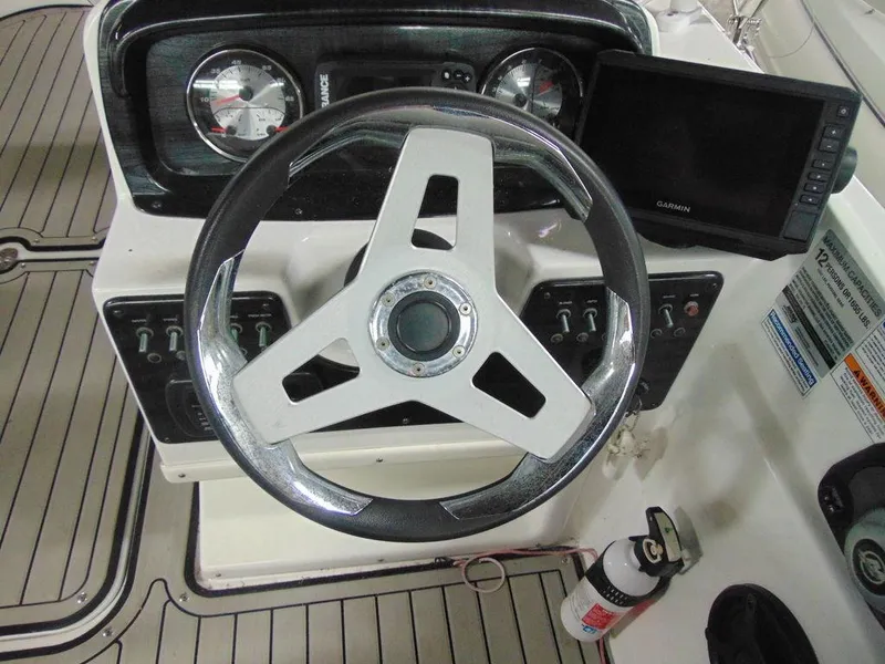 Slide: The Image of Steering console of a 2019 Hurricane SS 201 I/O boat with Garmin display. - 6