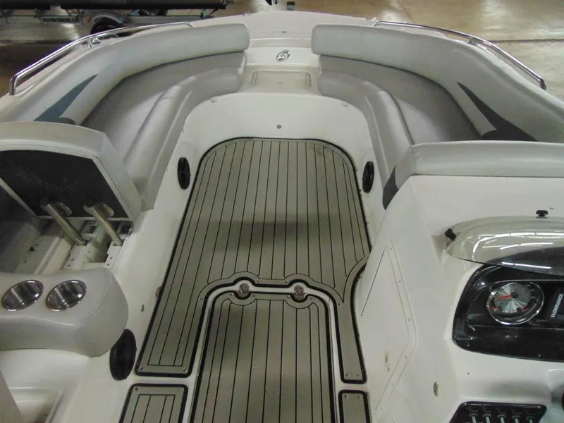 Slide: The Image of 2019 Hurricane SS 201 I/O boat interior with cushioned seating and non-slip flooring. - 7