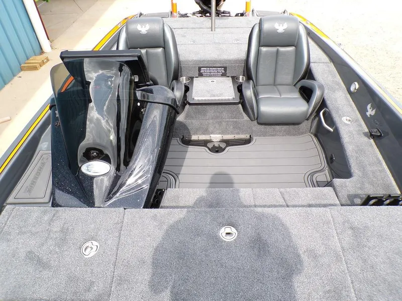 Slide: The Image of 2025 Phoenix 920 Elite boat interior with dual seats and sleek design. - 20