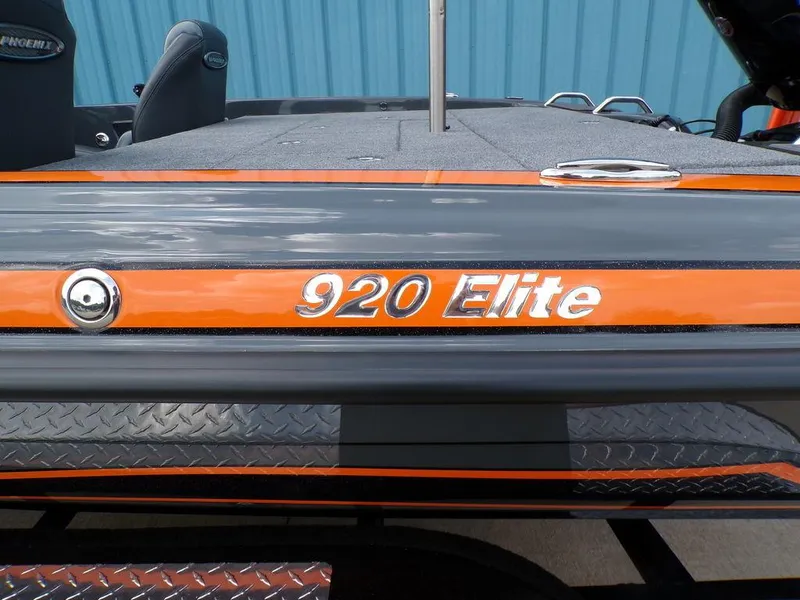 Slide: The Image of 2025 Phoenix 920 Elite boat with sleek design and orange detailing. - 5