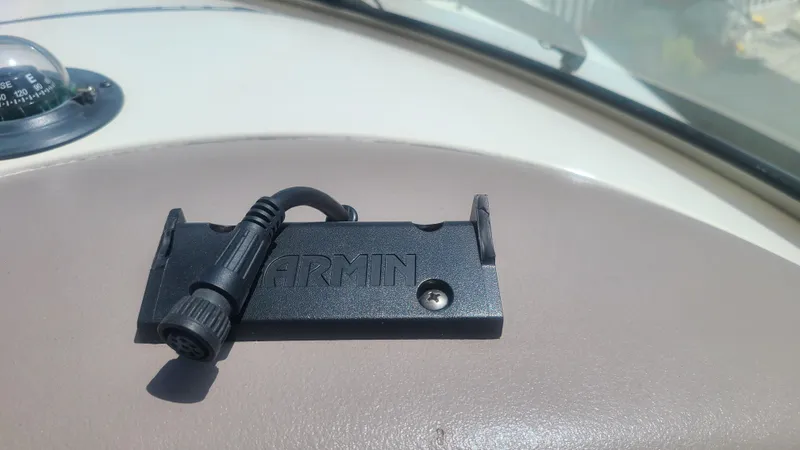 Slide: The Image of Garmin mount on 2004 Sea Ray 270 Sundeck dashboard. - 17