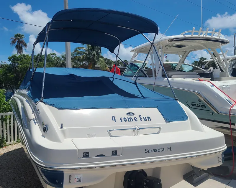 Slide: The Image of 2004 Sea Ray 270 Sundeck boat with blue canopy in Sarasota, FL. - 2