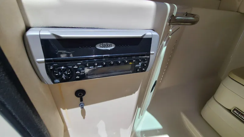 Slide: The Image of 2004 Sea Ray 270 Sundeck Clarion stereo system in cabin. - 22