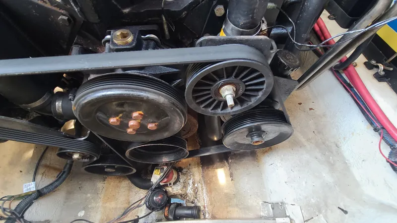 Slide: The Image of Engine components of a 2004 Sea Ray 270 Sundeck boat. - 30